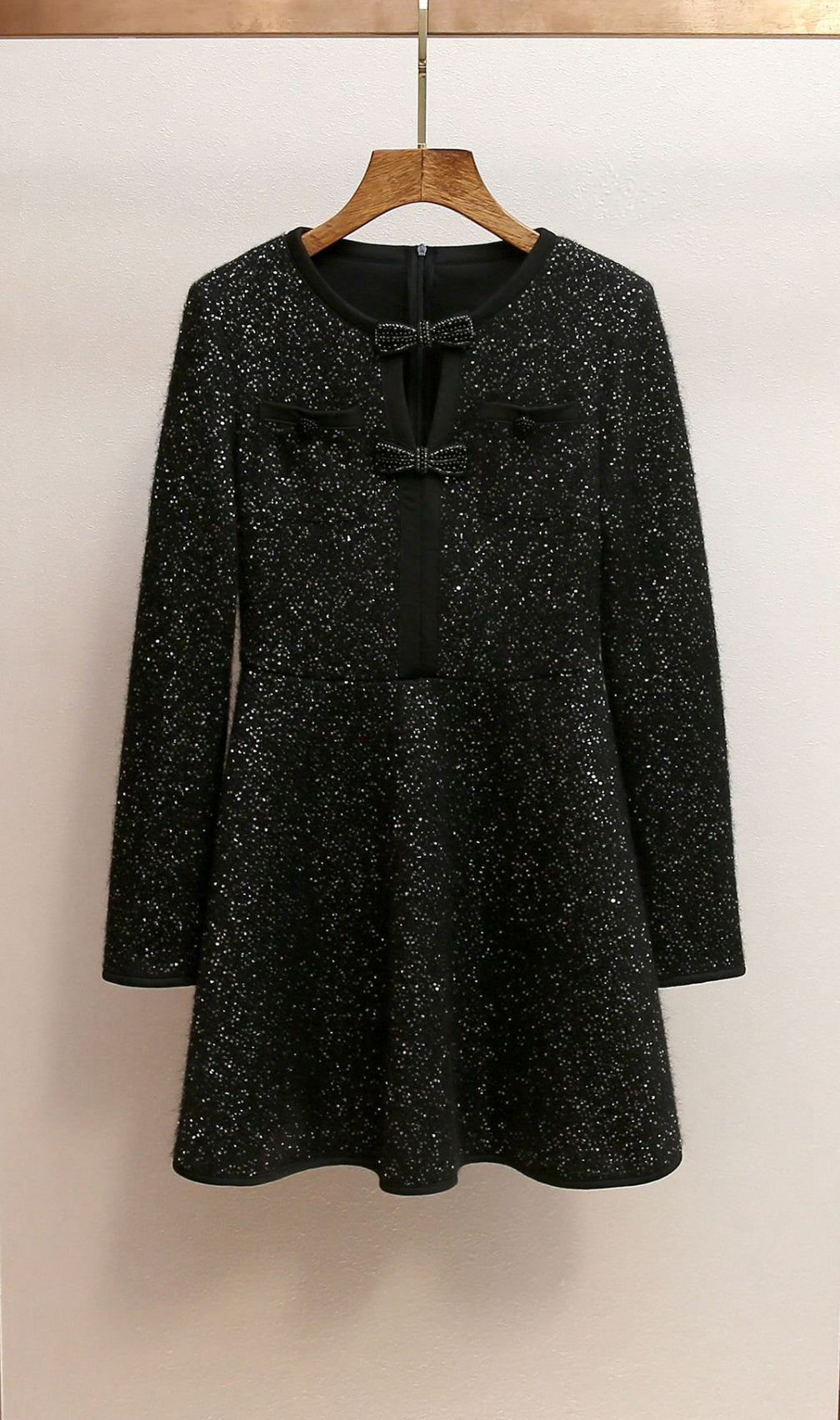 Dazzling Black Sequin Knit Mini Dress with Chic Bow Cut-Out