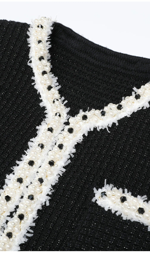 Kaula Sparkling Black Beaded Knit Midi Dress | Elegant Long Sleeve with Ruffle Cuffs