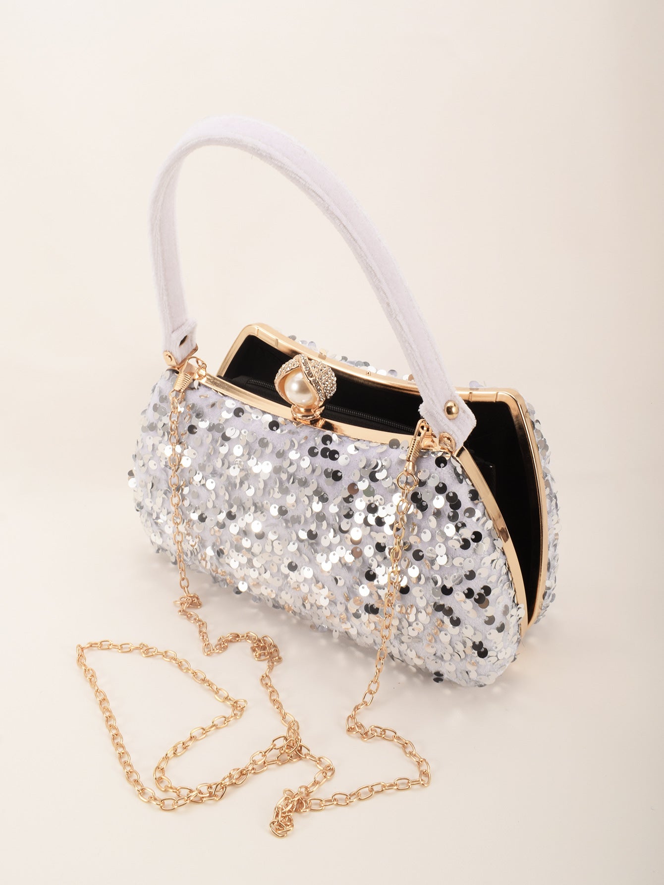 Sparkle & Shine: Anahid Royal Blue Sequin Evening Clutch with Pearl Accent