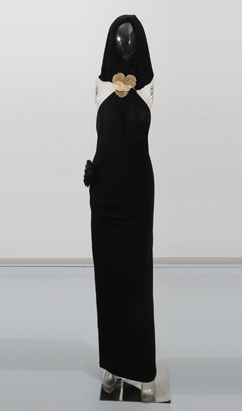 Jyn Black Halter Maxi Dress with Sculptural Floral Embellishment - Elegant Evening Gown