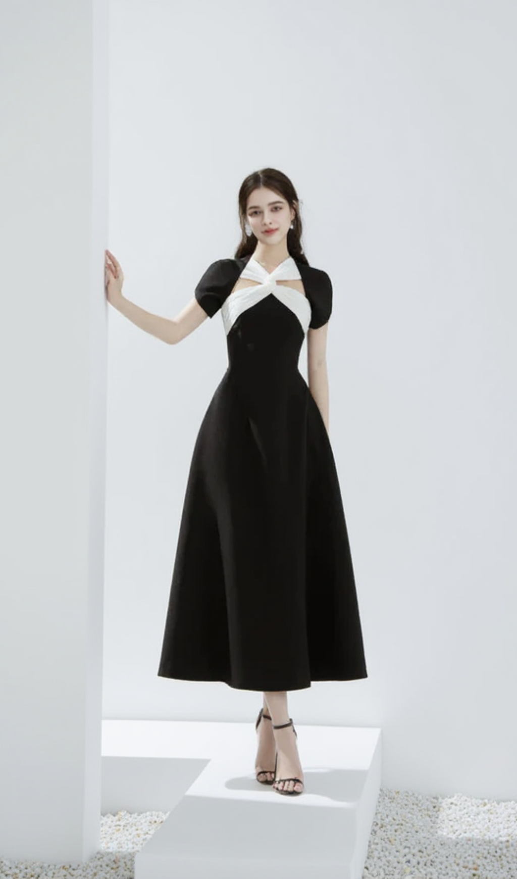 Andrea cut out a-line midi dress in black