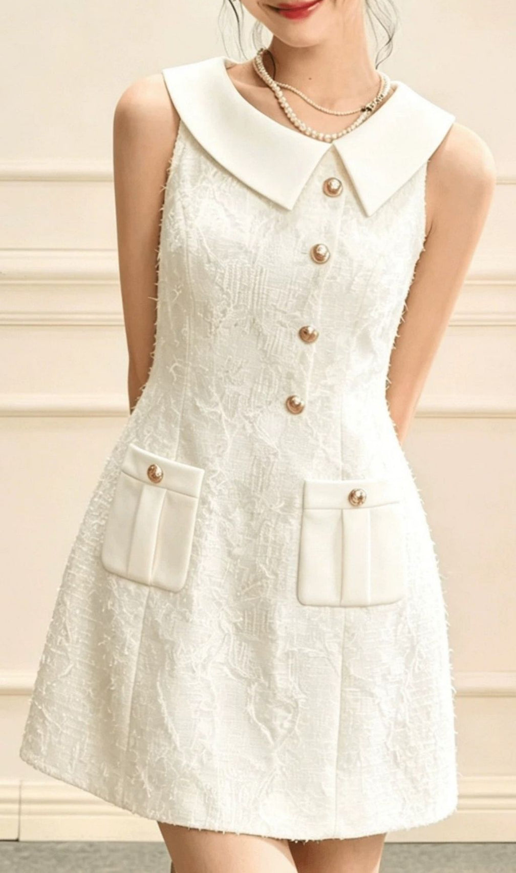 Kikuye Textured Mini Dress: Sleeveless, Chic Collar & Gold Buttons