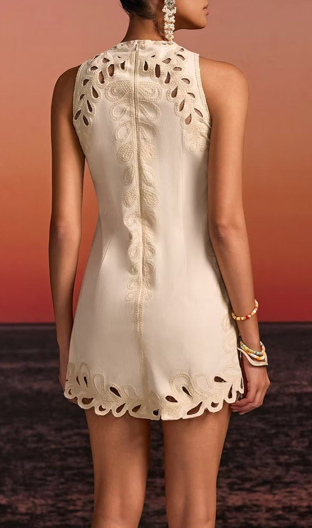 Delrix Intricate Laser-Cut Sleeveless Mini Dress - Chic Resort & Party Style