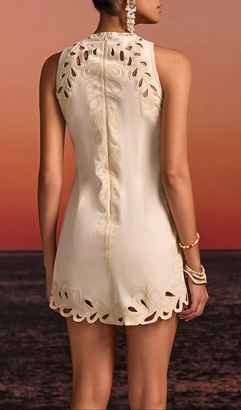 Delrix Intricate Laser-Cut Sleeveless Mini Dress - Chic Resort & Party Style