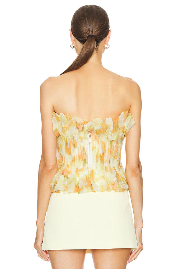 print ruffle trim top in yellow