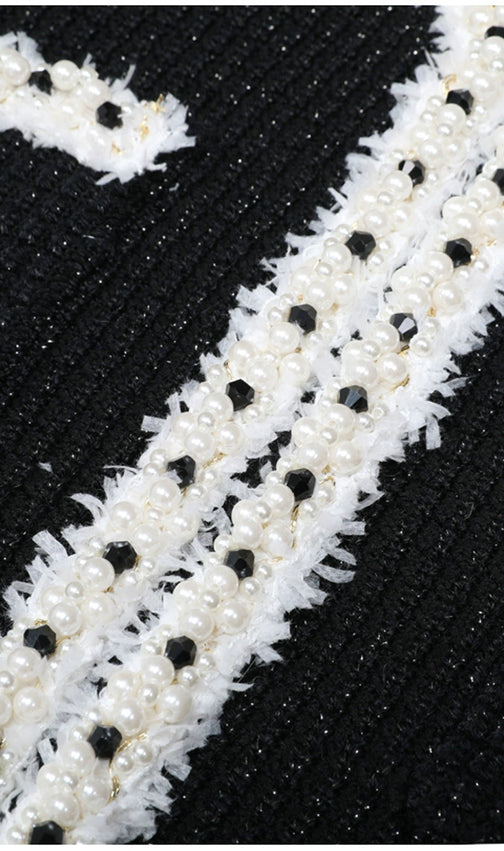 Kaula Sparkling Black Beaded Knit Midi Dress | Elegant Long Sleeve with Ruffle Cuffs