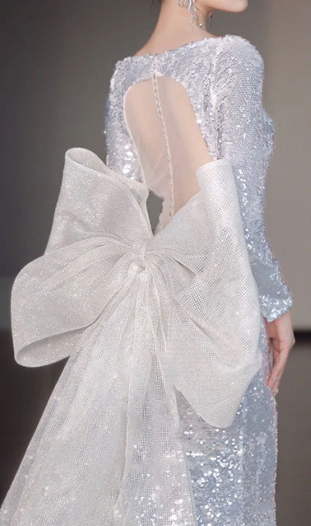 Cyma Sequin Long Sleeve Bow Maxi Dress