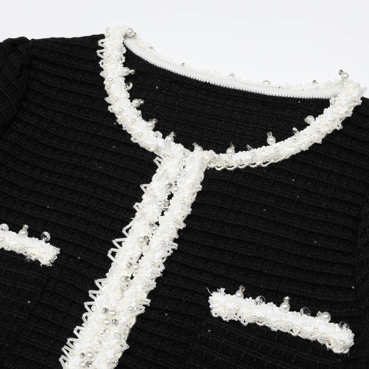 Kineta Chic Black Knit Mini Dress with White Contrast Trim – Long Sleeve Elegance
