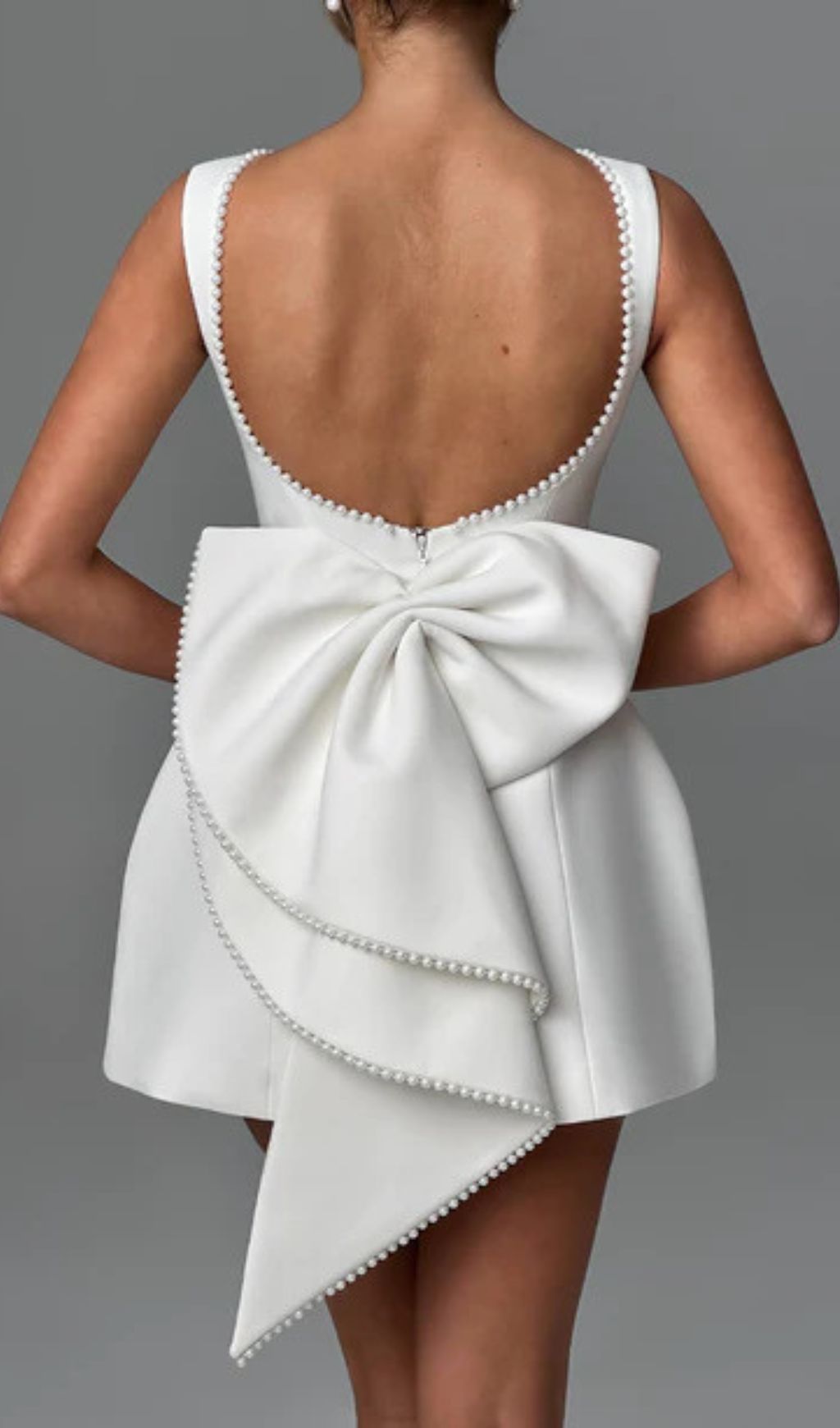 Eimear Elegant White Backless Pearl Bow Satin Mini Dress - Daring & Showstopping