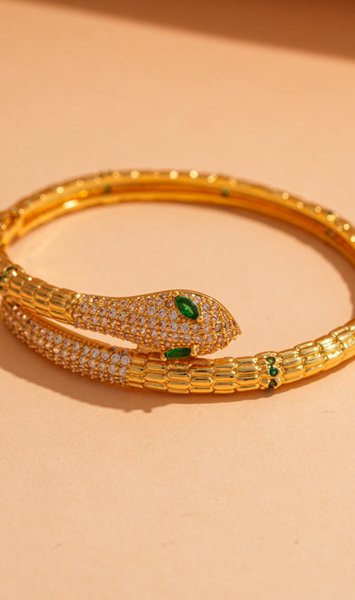 Jonila Dazzling Gold Serpent Bangle with Sparkling CZ & Emerald-Look Eyes