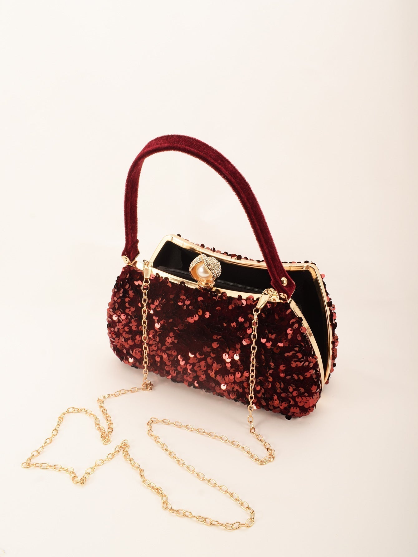 Sparkle & Shine: Anahid Royal Blue Sequin Evening Clutch with Pearl Accent