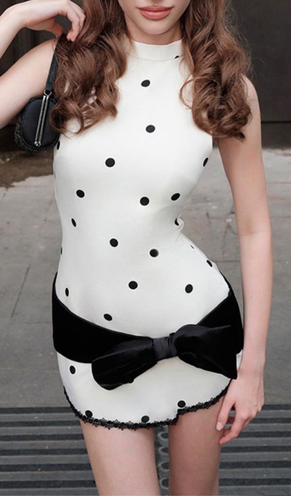 Karida Chic Sleeveless Polka Dot Mini Dress with Statement Bow
