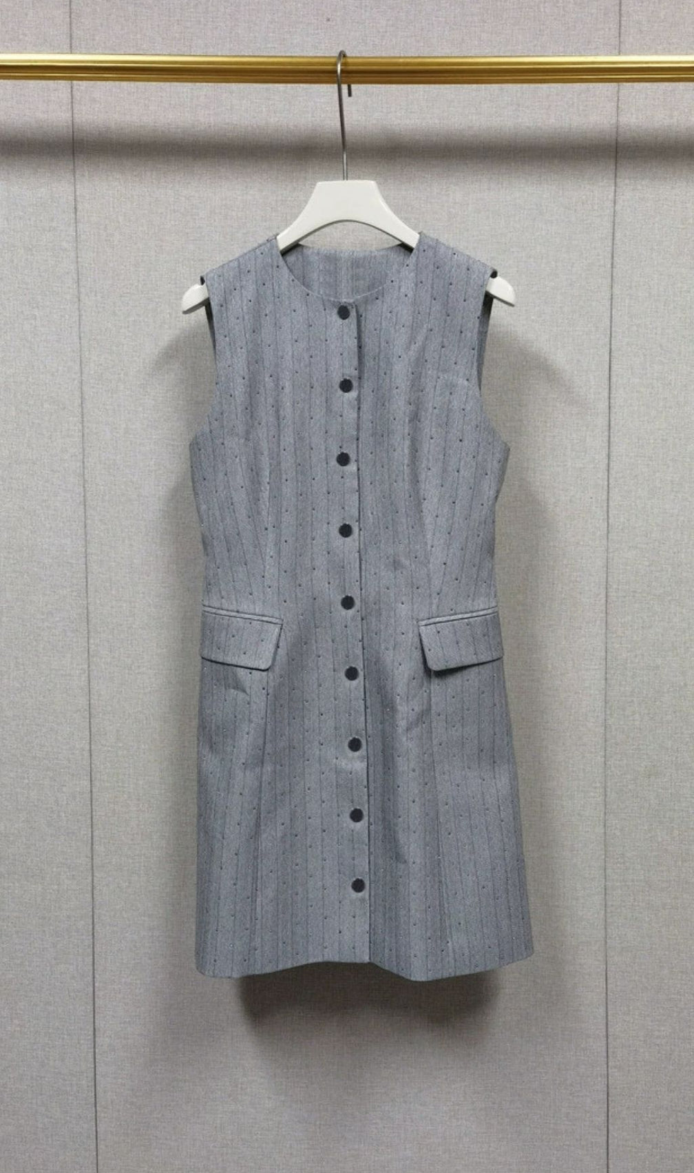 Effortless Chic: Sleeveless Button-Front Mini Dress with Subtle Sparkle