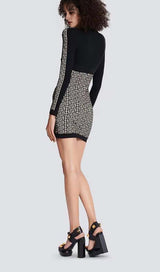 SHOULDER PADS KNITTED MINI DRESS IN BLACK