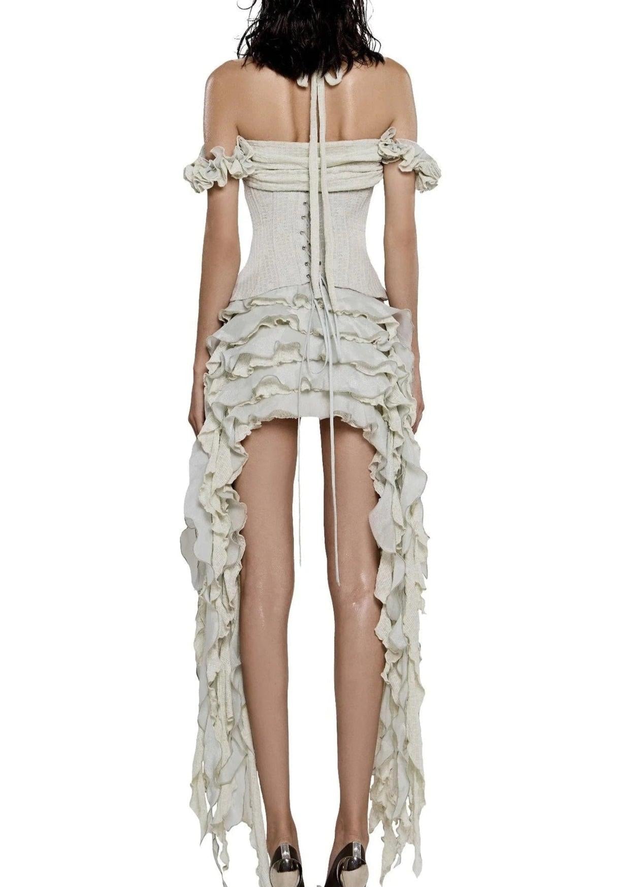 elva halter three-dimensional flower irregular tassel mini dress in Beige